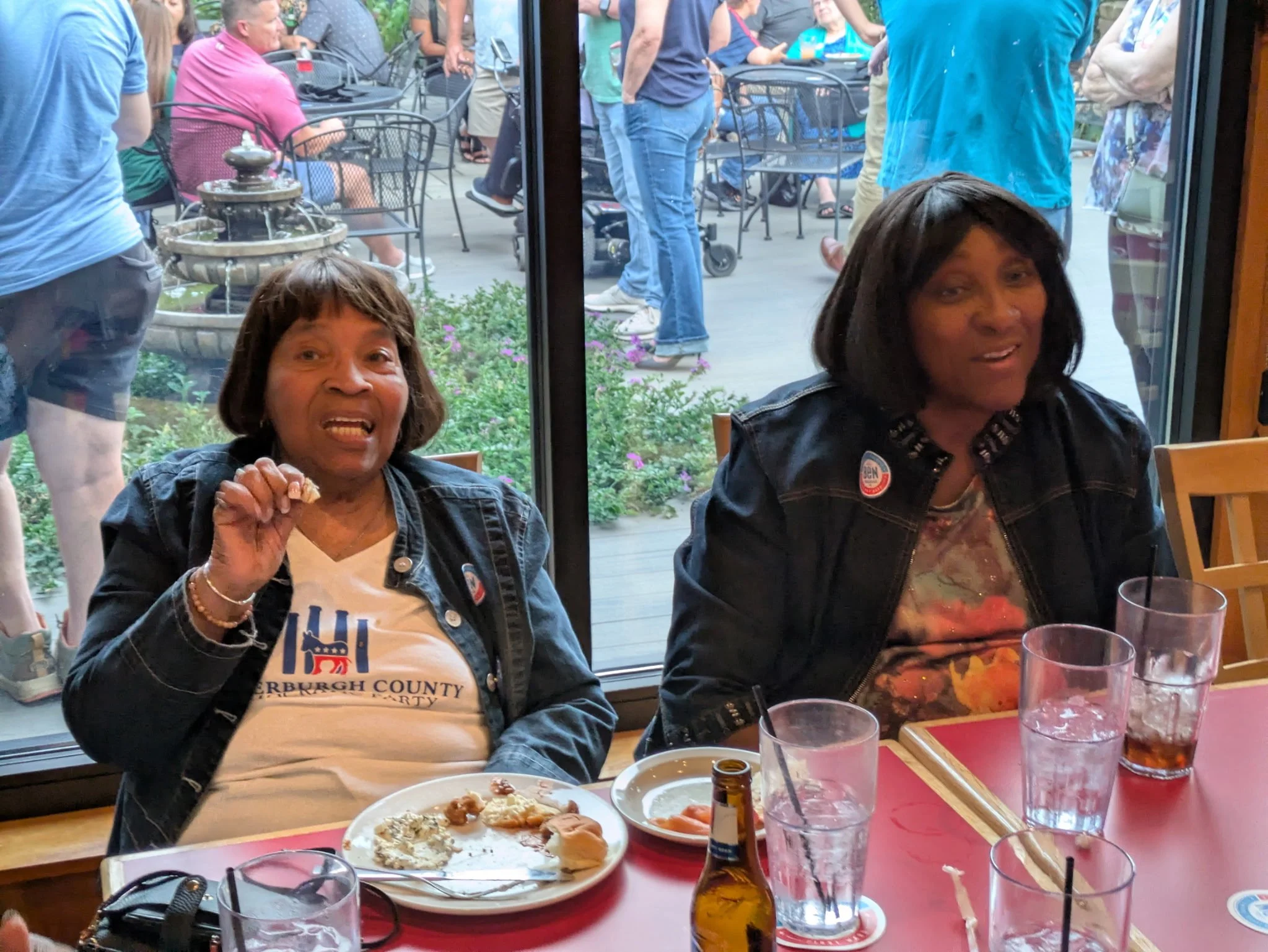 Sally Busby meeting with local families and neighborhood advocates